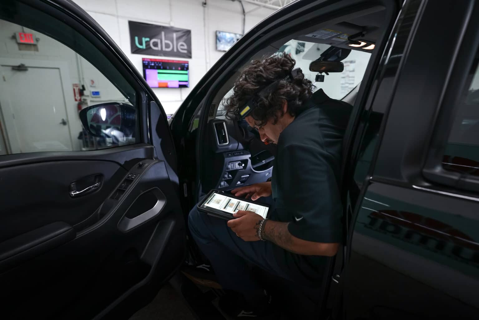 XTREME technician configuring a vehicle system